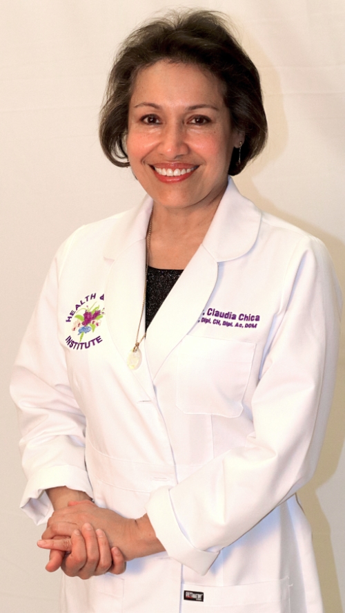 Female doctor posing in white lab coat